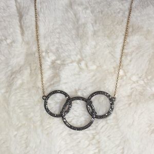 Gold tone and gunmetal gray crystal necklace